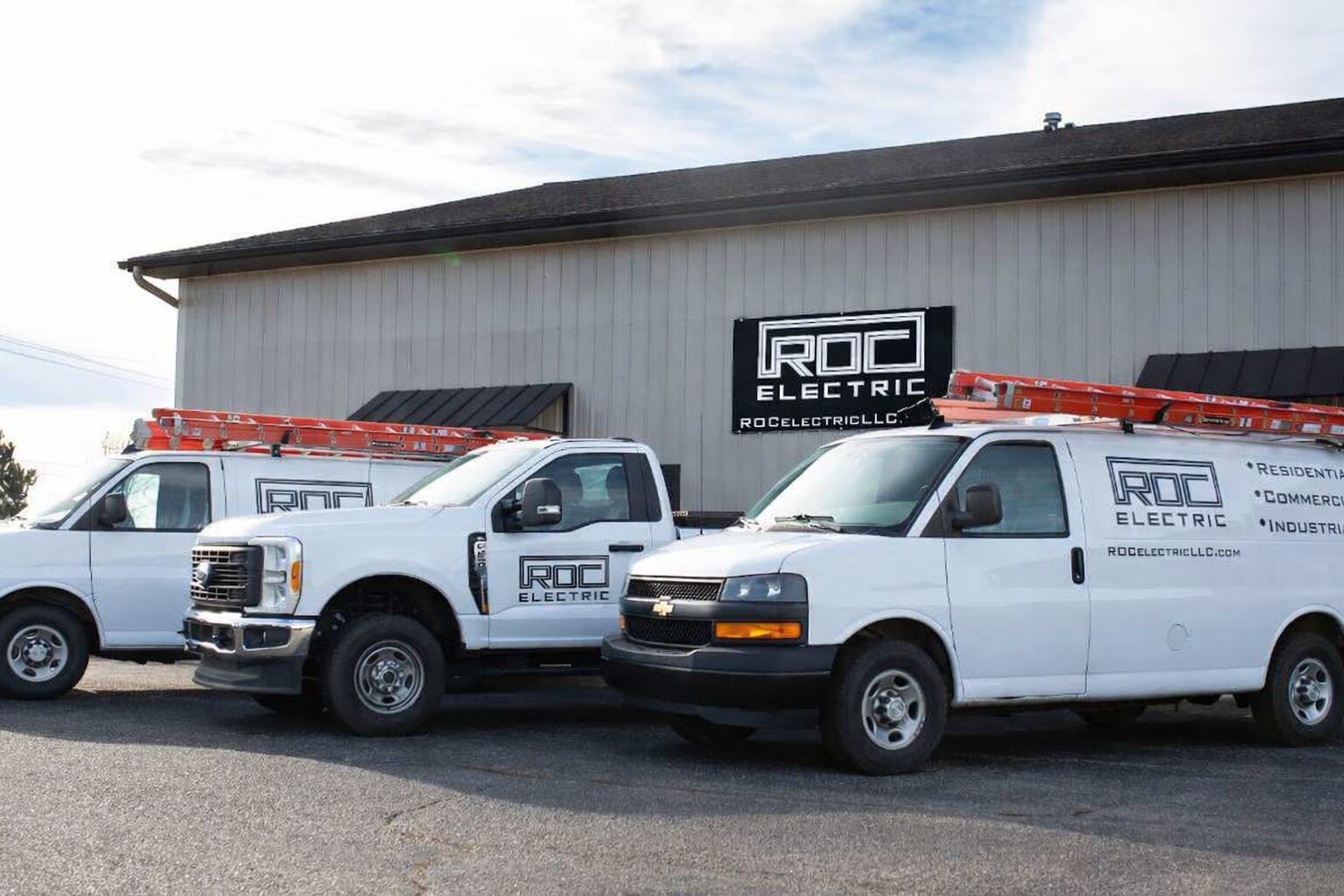 ROC Electric crew working on electrical panel