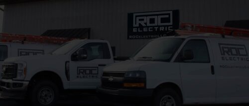 roc electric building exterior and trucks